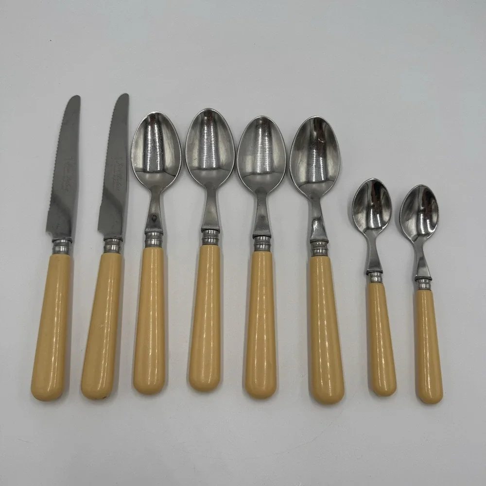 Jean Dubost Yellow Flatware 8 Pc Lot Stainless France Knives Spoons